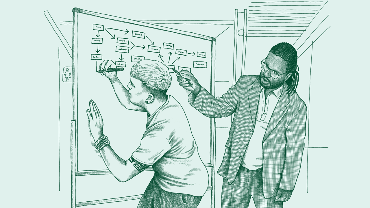 A young Black man and a young white man work together on a flowchart at a whiteboard. 