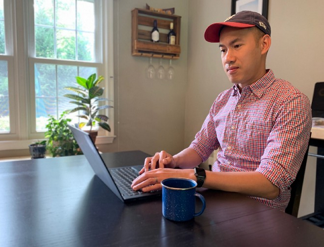 Infrastructure engineer, Wei Leong working from home.