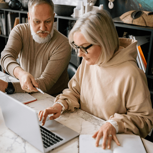 Man and woman at a computer
